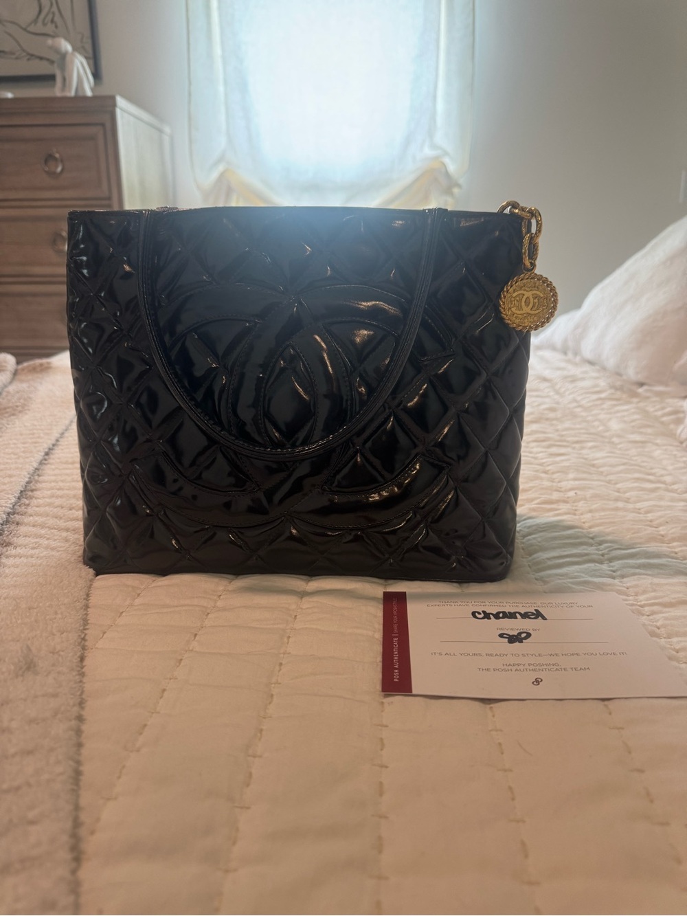 CHANEL Black Quilted Patent Leather Tote with Gold CC Charm